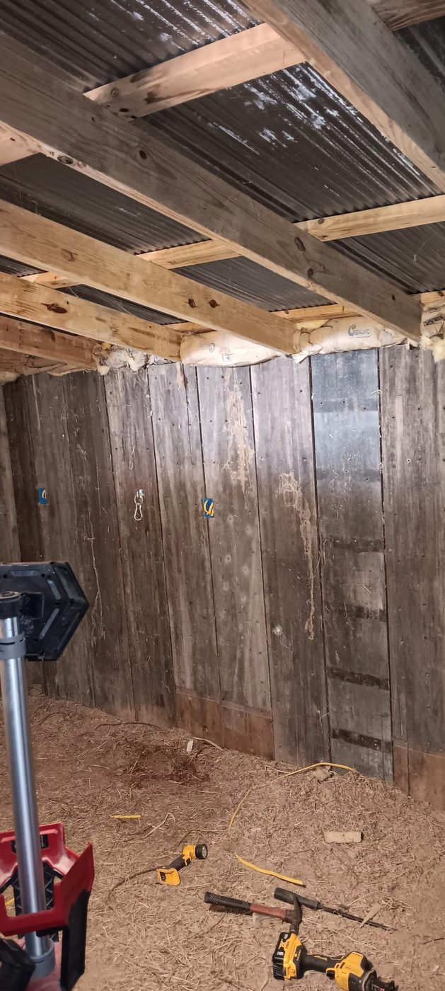 Electrical rough-in with outlet boxes on wood framing at a job site